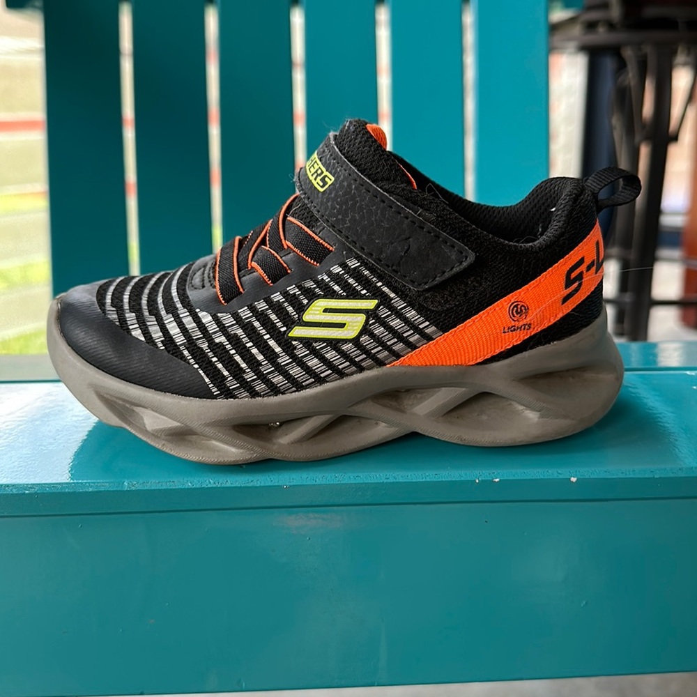Toddler size 10 Skechers sneakers.